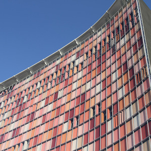 Building with coloured window blinds