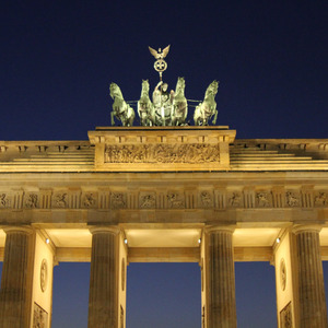 Brandenburg Gate at night with statue of Victory