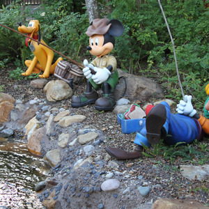 Mickey, Goofy, and Pluto fishing
