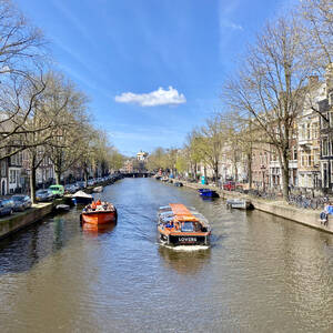 Boats on a canal in Amsterdam
