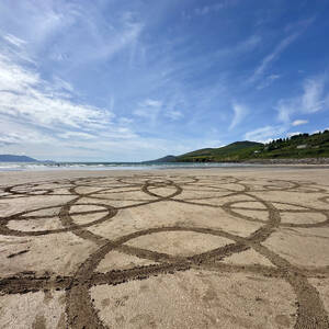 Celtic knot sand art on Inch Beach